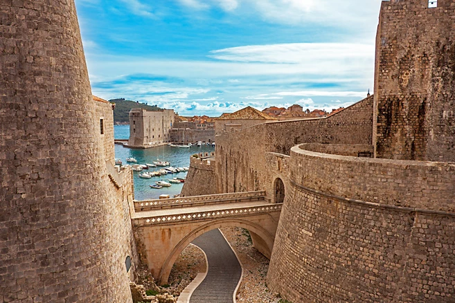 Explore Dubrovnik's medieval fortifications and port